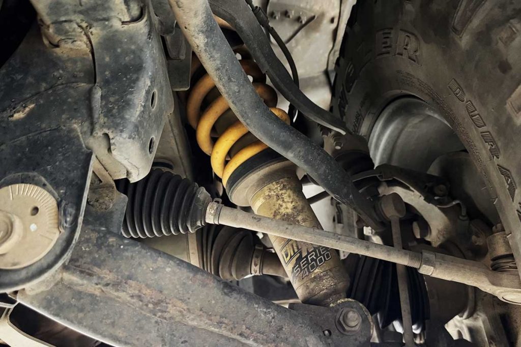 Suspension and shock absorber repairs improving vehicle handling and safety