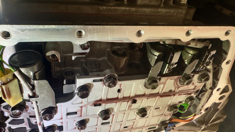 adjustment interface of automatic transmission actuators and bands, checked during scheduled servicing